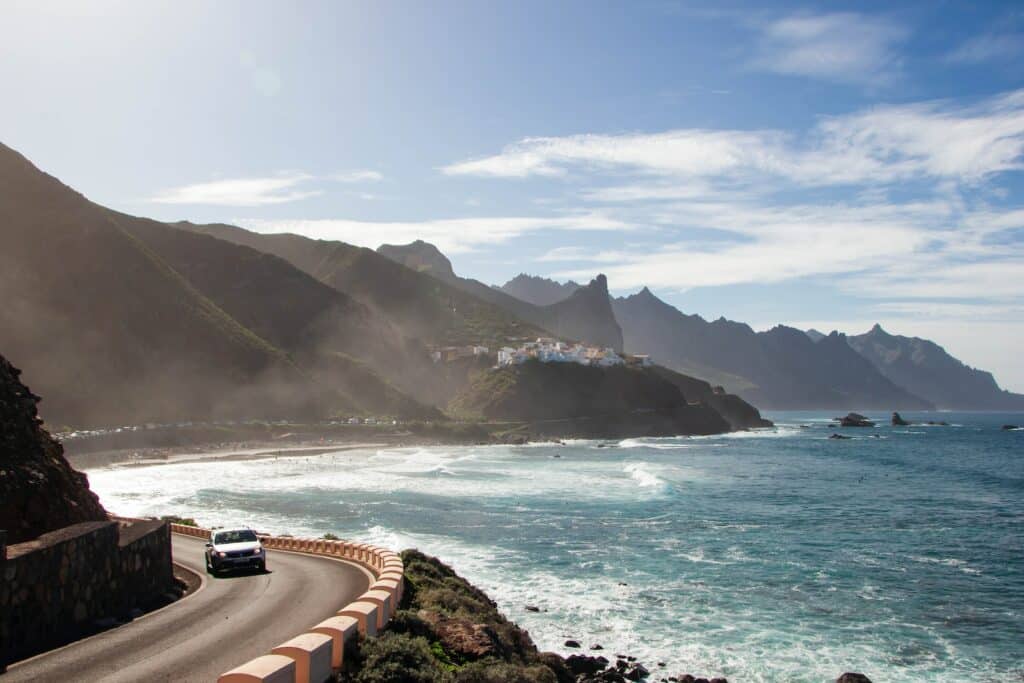 Photo by Maria Lupan white car passing through road